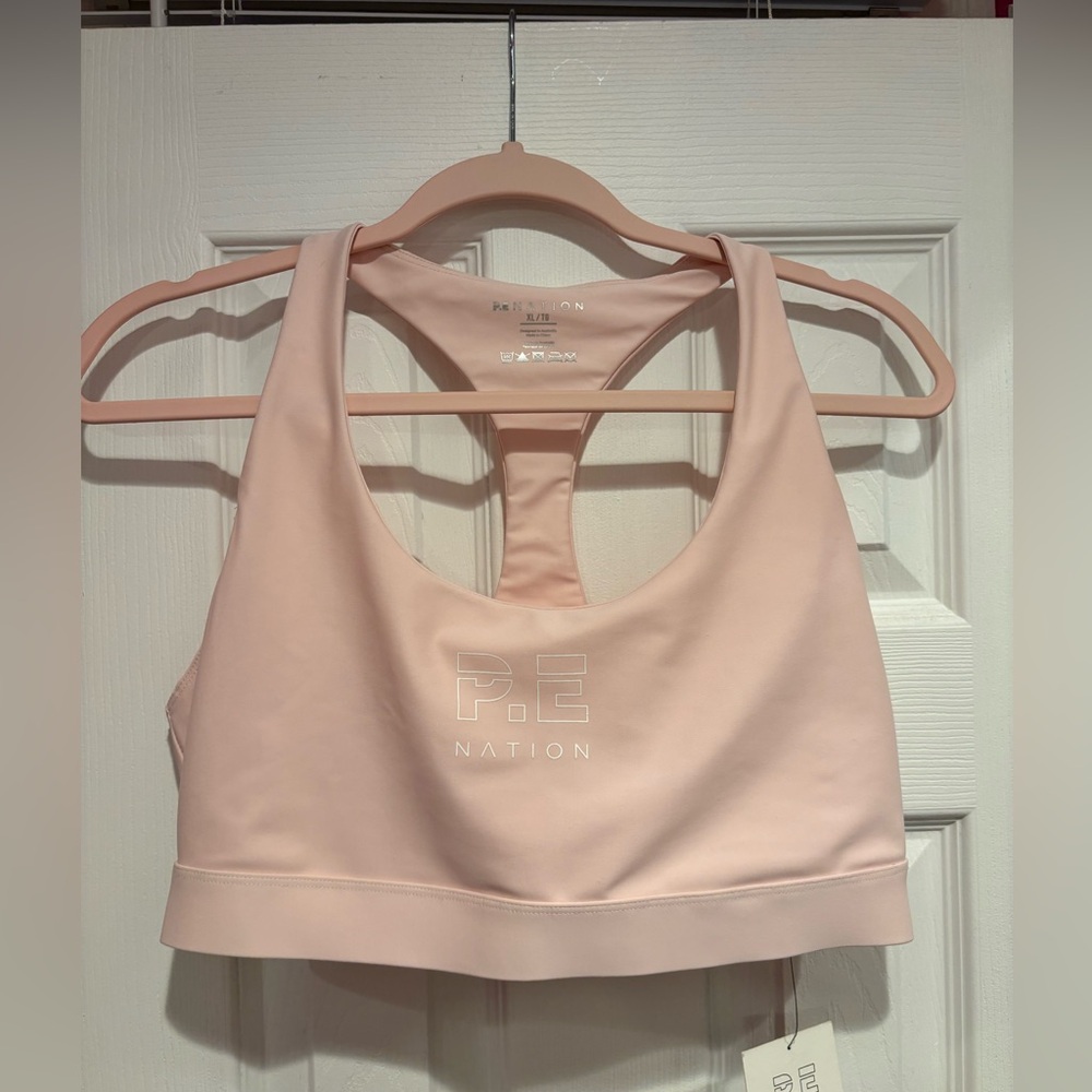 PE NATION baby pink sports bra